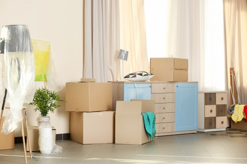 Moving team handling boxes safely during a Twickenham van removal