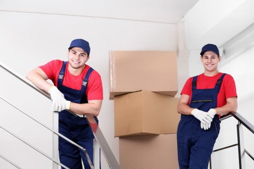 Local team collecting sofas and chairs from a Twickenham property