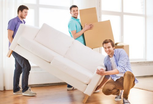 Packed office equipment ready for transport during a Twickenham business move