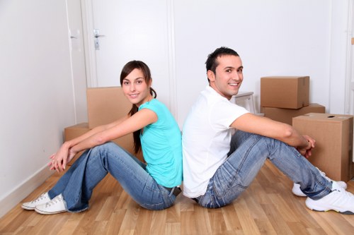 Careful carrying of furniture during a local student relocation