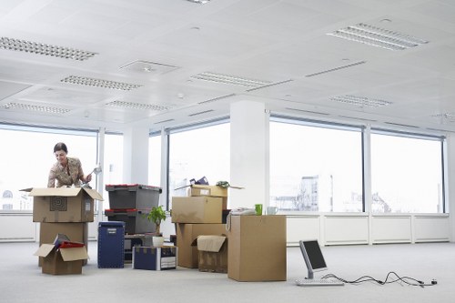 Packed boxes and furniture prepared for a home move in Twickenham